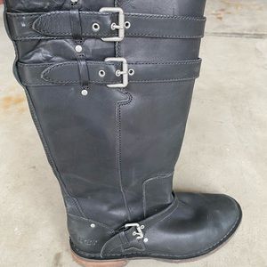 Black Ugg knee boots with side zipper .